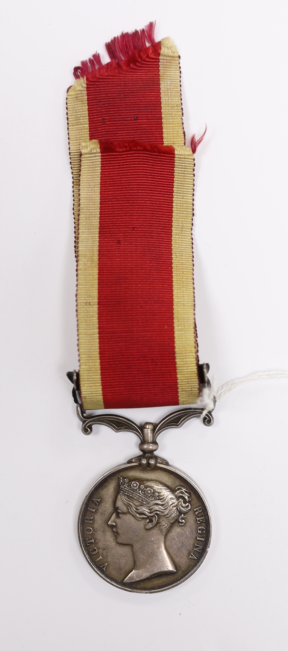 An 1843 Victoria China War Medal, unnamed, with bar for Canton 1857